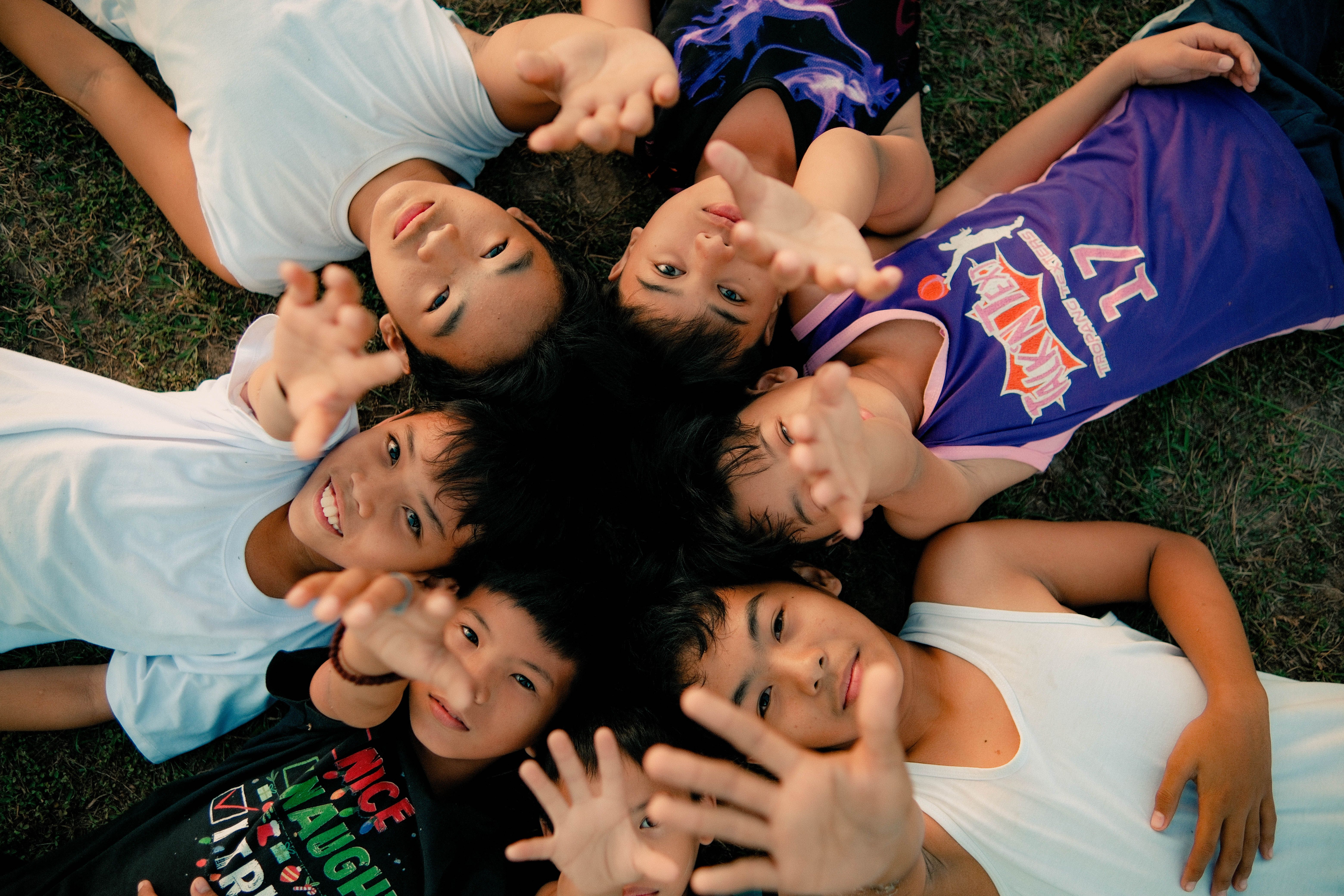 Filipino children reaching out